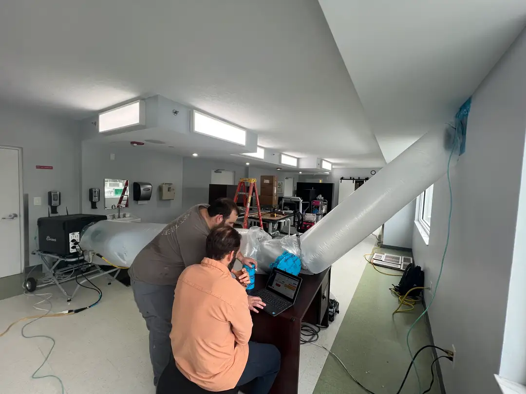 Clean Air Miami certified technicians performing Aeroseal duct sealing service in South Florida